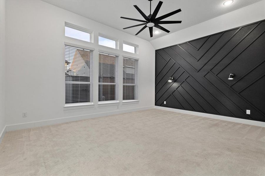 Empty room with a ceiling fan, light carpet, and recessed lighting Empty room with a ceiling fan, light carpet, and recessed lighting