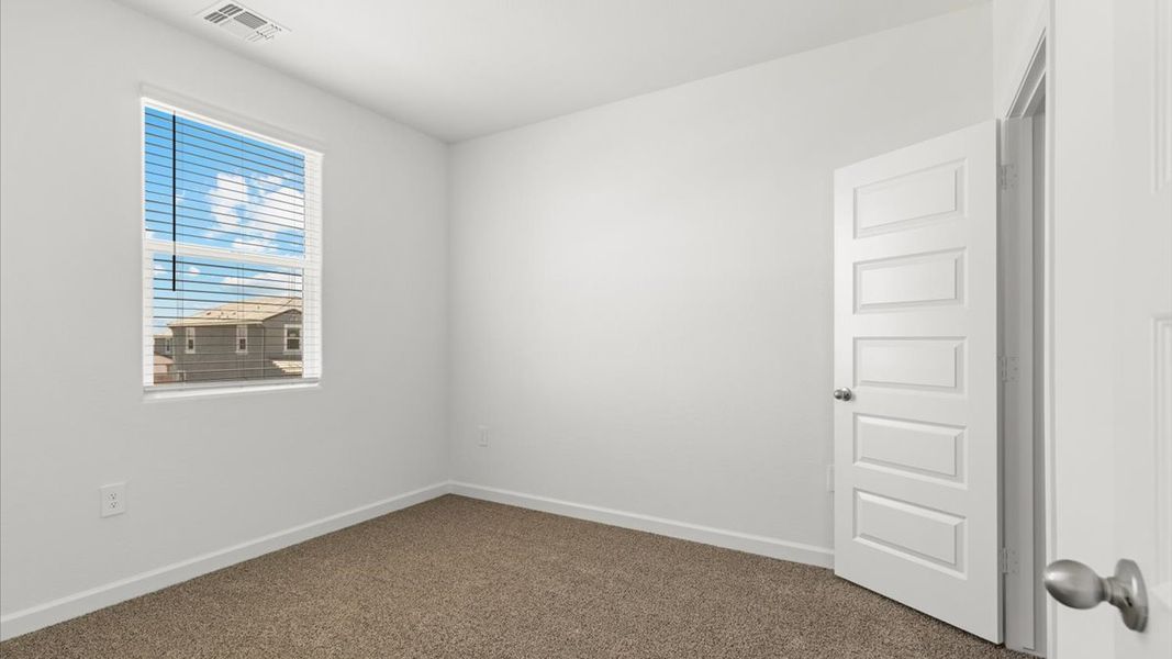 Spacious, unfurnished interior of a new home in Radiance at Superstition Vistas, Apache Junction (Image 28).