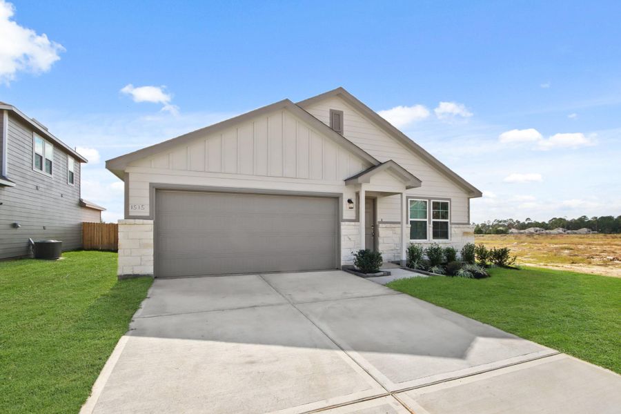 Front exterior of a new home in The Villages at Westpointe, Dayton, TX, highlighting curb appeal (Image 2). Front exterior of a new home in The Villages at Westpointe, Dayton, TX, highlighting curb appeal (Image 2).
