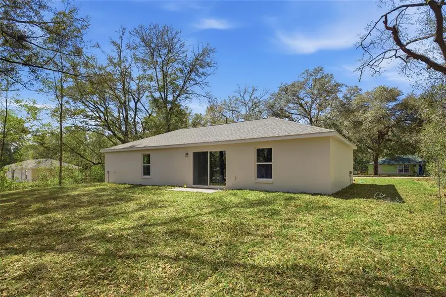 Exterior details and patio area of a home in , Summerfield (Image 4).