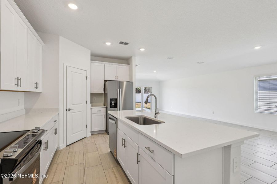 Furnished interior view inside a new home in Colbert Landings, Palm Coast (Image 6).
