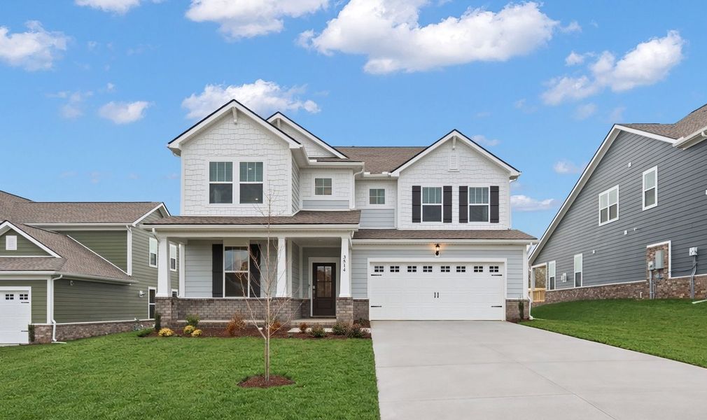 Front exterior of a new home in Arbors at Compton, Murfreesboro, TN, highlighting curb appeal (Image 1). Front exterior of a new home in Arbors at Compton, Murfreesboro, TN, highlighting curb appeal (Image 1).