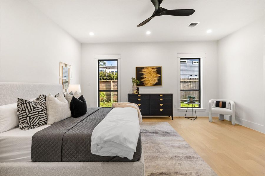 Your private primary suite offers a peaceful retreat with generous proportions, abundant natural light, and plenty of space to unwind.