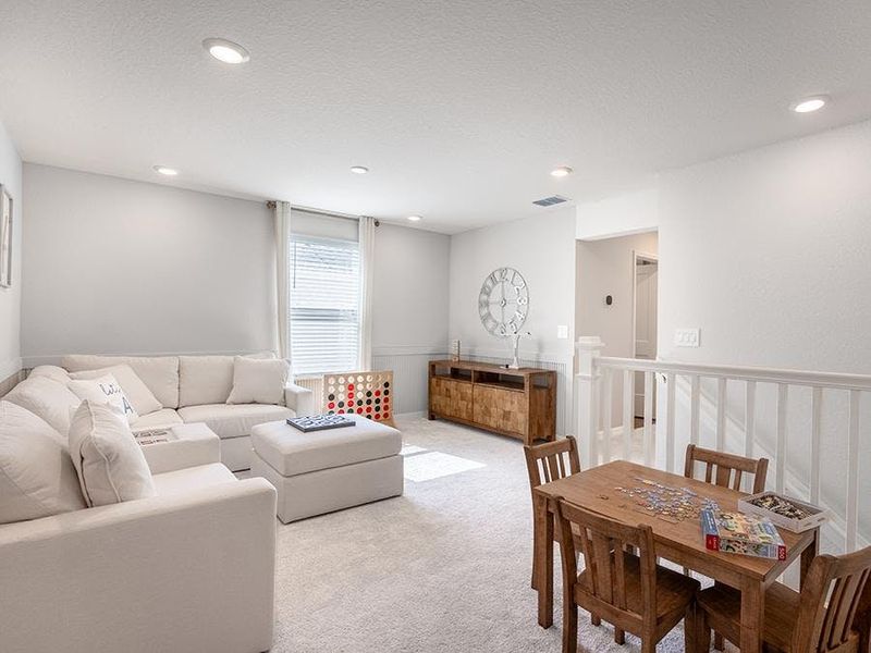 Upstairs, a loft provides desirable flex-use space - Aria bungalow by Highland Homes