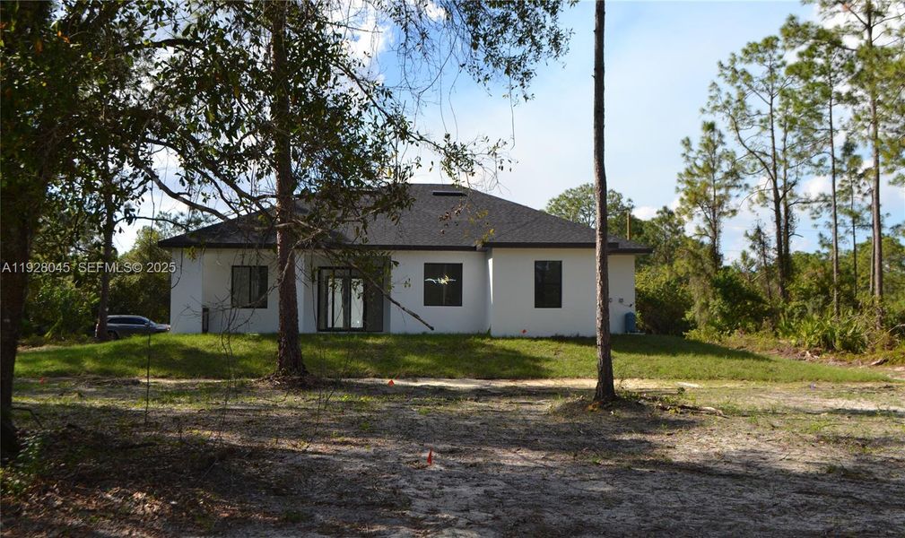 Exterior details and patio area of a home in , Lehigh Acres (Image 3).