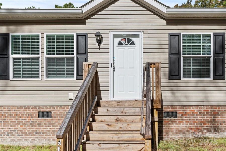 Exterior details and patio area of a home in , Ruby (Image 2). Exterior details and patio area of a home in , Ruby (Image 2).