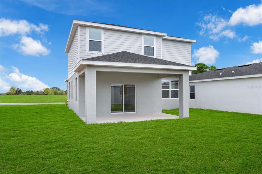 Exterior details and patio area of a home in Oakfield Trails, Parrish (Image 24).