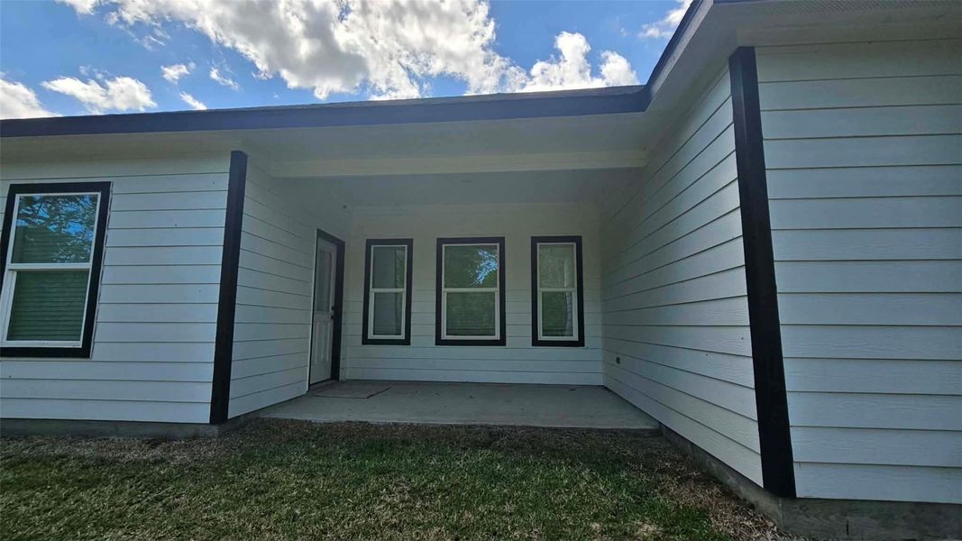 Exterior details and patio area of a home in , Kenefick (Image 4).