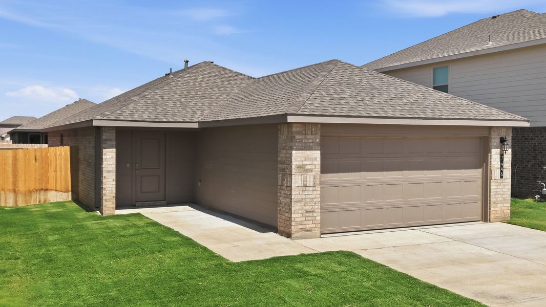 Front exterior of a new home in Terra Vista, Lubbock, TX, highlighting curb appeal (Image 2). Front exterior of a new home in Terra Vista, Lubbock, TX, highlighting curb appeal (Image 2).