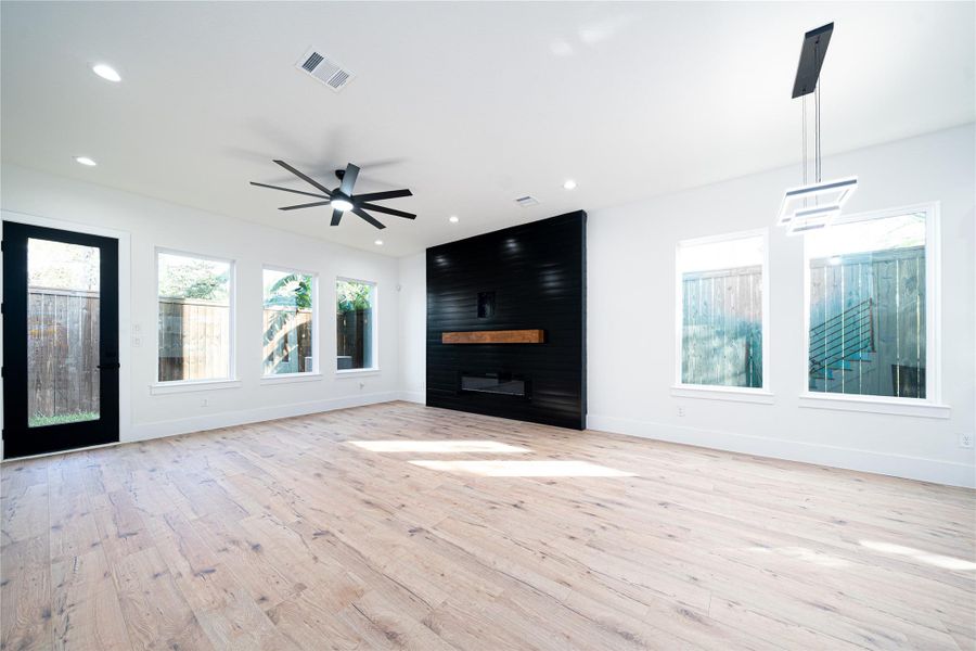 This spacious living room features energy-efficient windows that create a bright, comfortable space to relax and unwind in your home. This spacious living room features energy-efficient windows that create a bright, comfortable space to relax and unwind in your home.