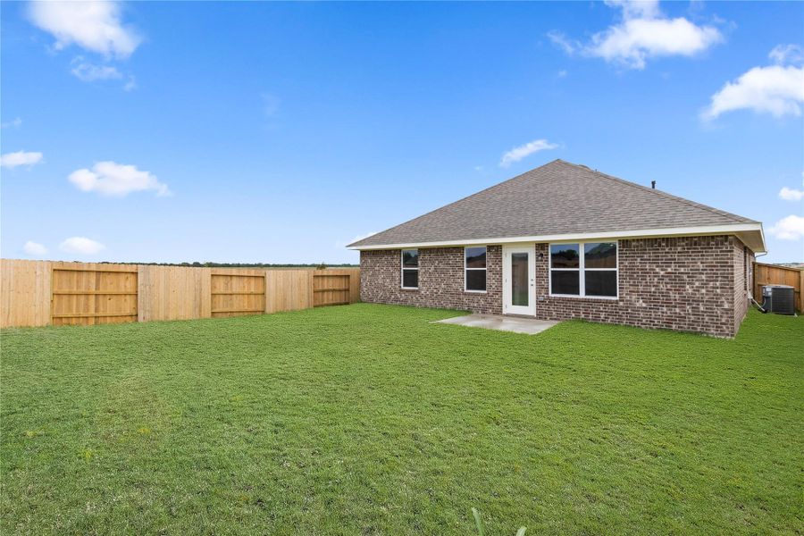 Exterior details and patio area of a home in River Ranch Trails, Dayton (Image 3).