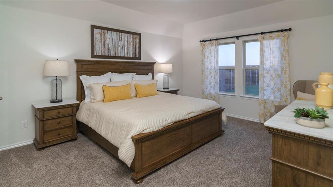 Bedroom with dark carpet