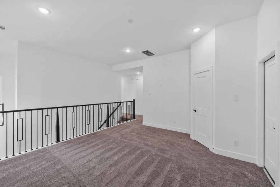 Spacious, unfurnished interior of a new home in Meridiana, Manvel (Image 21).