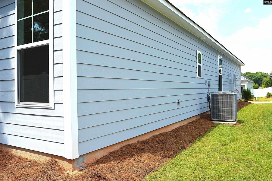 Exterior details and patio area of a home in Bickley Station, Irmo (Image 25).