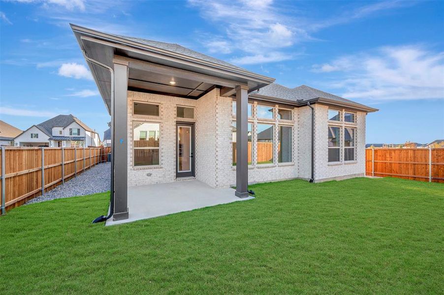 Exterior details and patio area of a home in Sandbrock Ranch, Aubrey (Image 3).