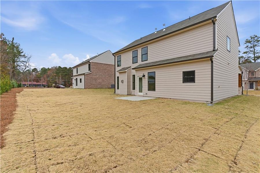 Exterior details and patio area of a home in The Overlook at Factory Shoals, Mableton (Image 16).