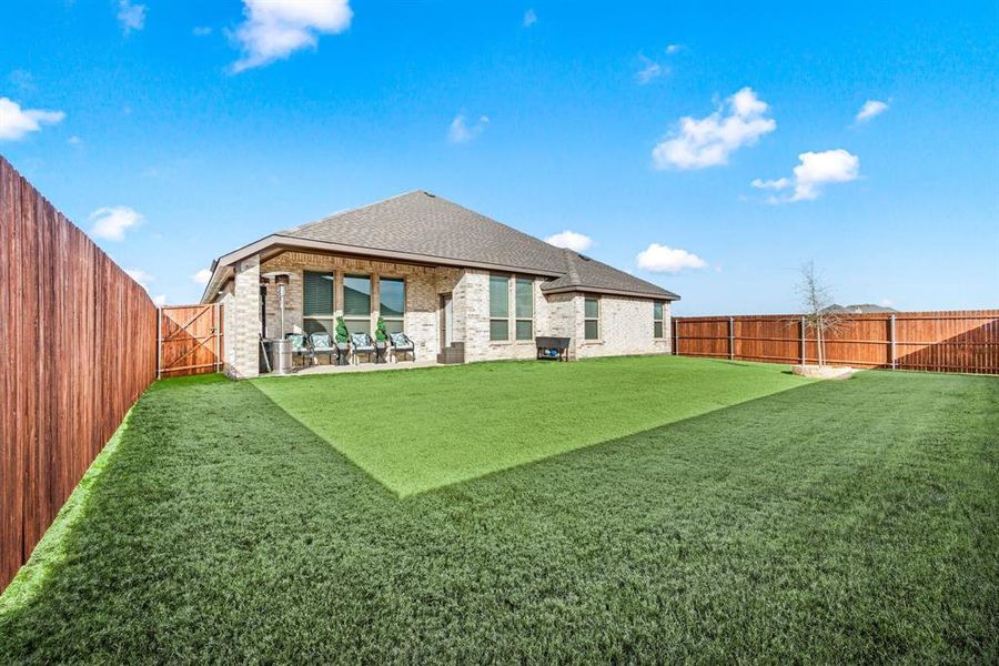 Exterior details and patio area of a home in Timberbrook, Justin (Image 23).
