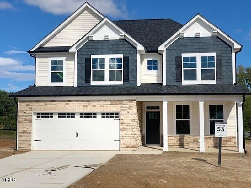 Front exterior of a new home in Wellers Knoll, Lillington, NC, highlighting curb appeal (Image 63).