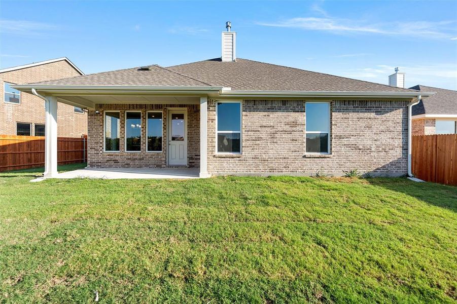 Exterior details and patio area of a home in Morningstar, Aledo (Image 20).