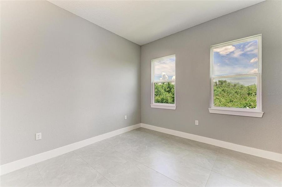 Spacious, unfurnished interior of a new home in , Port Charlotte (Image 36).