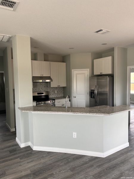 Furnished interior view inside a new home in , Nixon (Image 3).