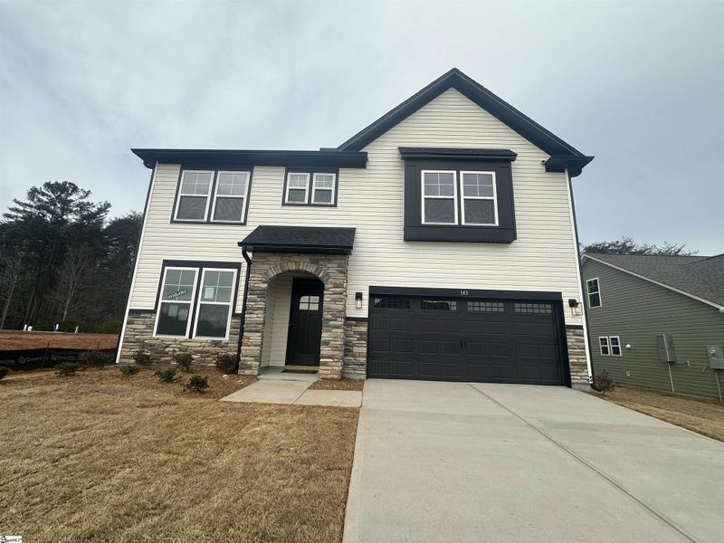 Front exterior of a new home in Shiloh Trail, Wellford, SC, highlighting curb appeal (Image 2).