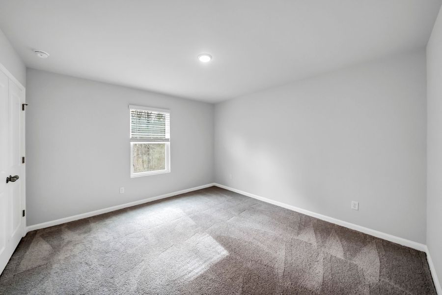 Spacious, unfurnished interior of a new home in Monroe Preserve, Chapin (Image 38).