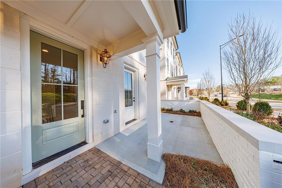 Exterior details and patio area of a home in Mayfair on Main, Alpharetta (Image 30).