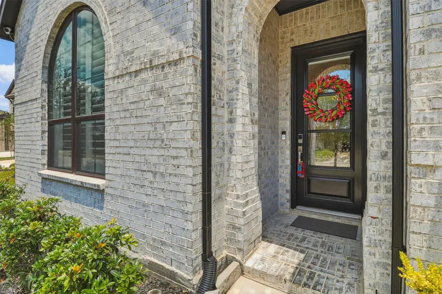 Exterior details and patio area of a home in , Brookshire (Image 3).