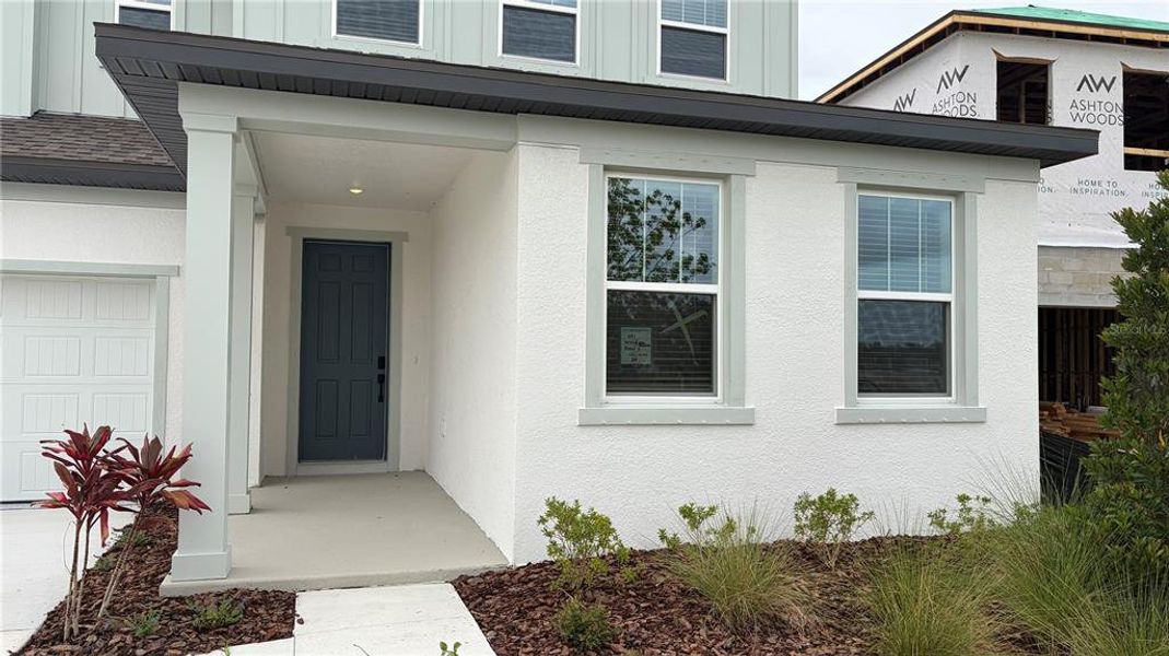 Exterior details and patio area of a home in Oakfield Trails, Parrish (Image 3).