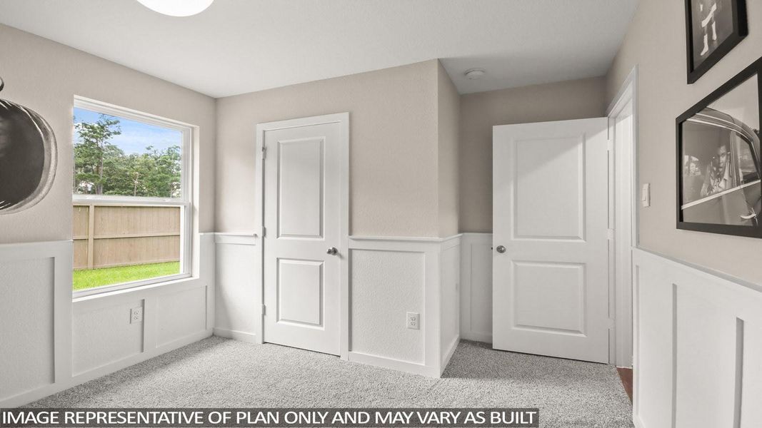 Furnished interior view inside a new home in Sunterra, Katy (Image 15).