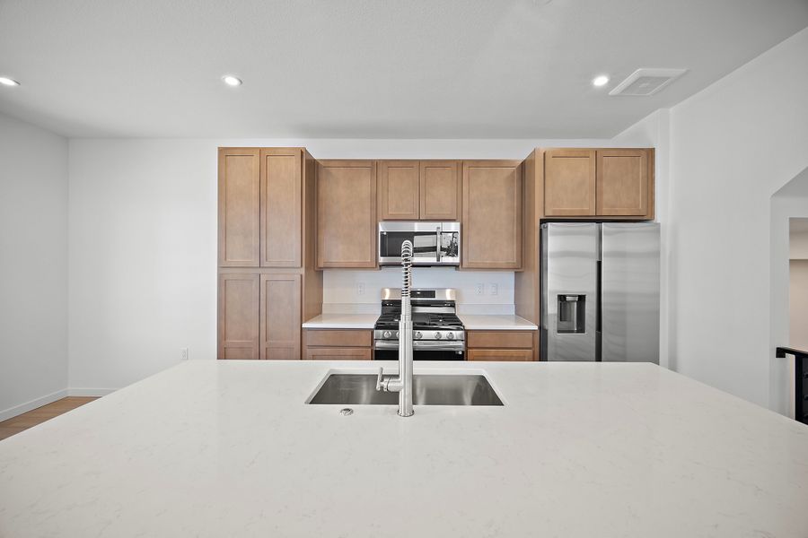 Furnished interior view inside a new home in Lyric at RidgeGate Townhomes, Lone Tree (Image 9).