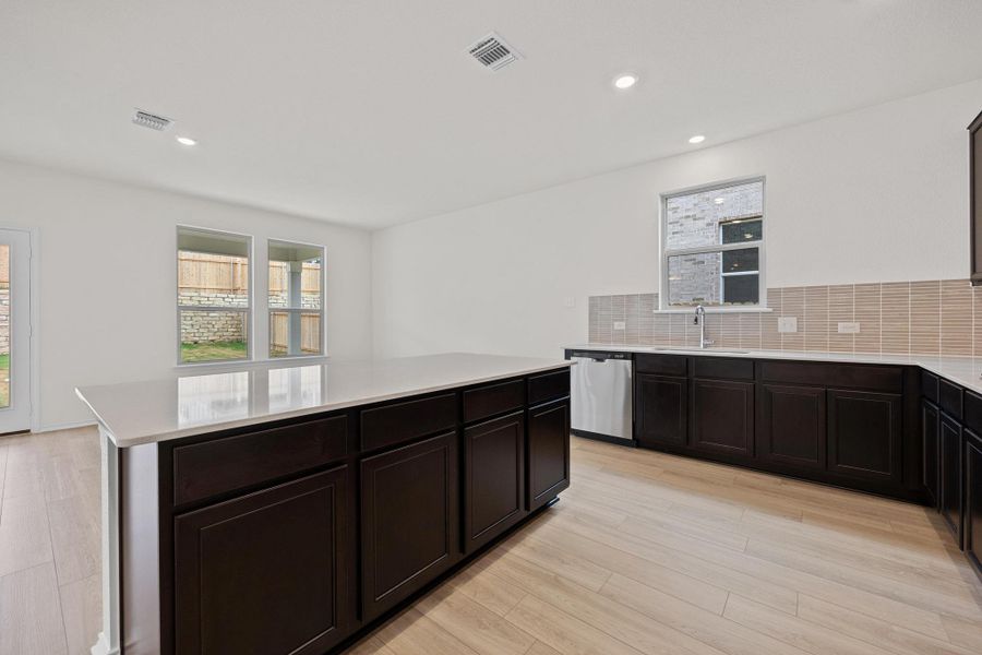 Furnished interior view inside a new home in Salerno - Classic Collection, Round Rock (Image 5). Furnished interior view inside a new home in Salerno - Classic Collection, Round Rock (Image 5).