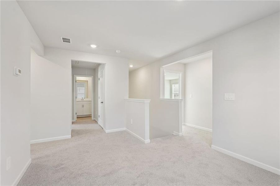 Spacious, unfurnished interior of a new home in Hawthorne Station, College Park (Image 36).