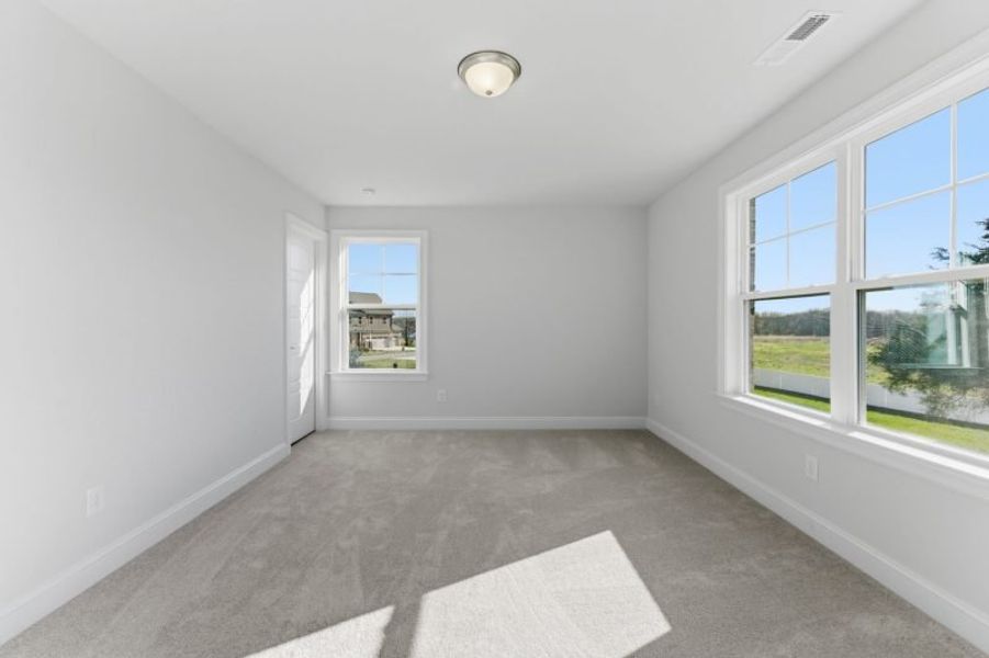 Representative unfurnished interior of a home built from the Fairfield Lux by Keystone Homes NC in Weybridge, Burlington (Image 105).