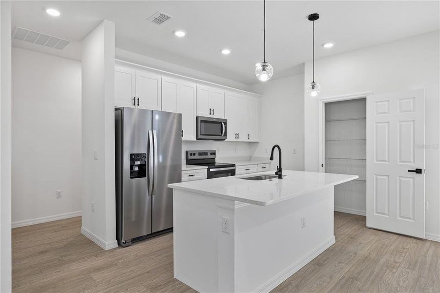 Furnished interior view inside a new home in , Poinciana (Image 8).