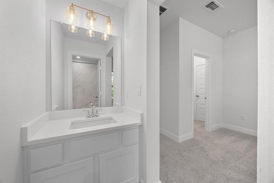 Furnished interior view inside a new home in Parmer Ranch - 60', Georgetown (Image 13).