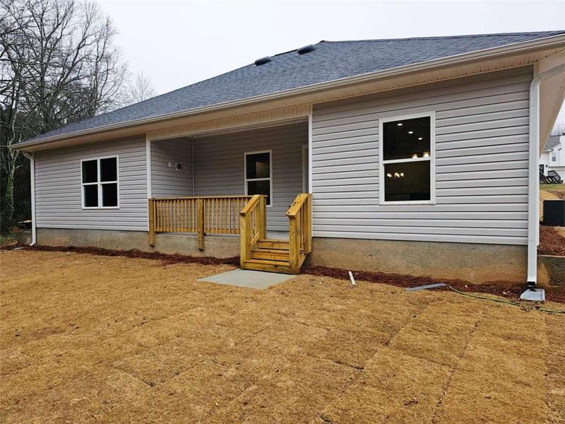 Exterior details and patio area of a home in Scarlett Place, Bowdon (Image 3).
