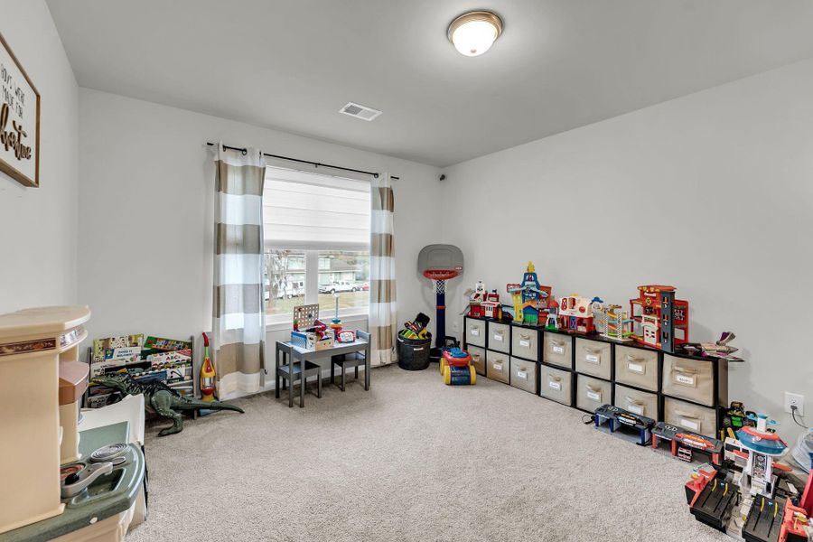 Furnished interior view inside a new home in Cordgrass Landing, Johns Island (Image 32).
