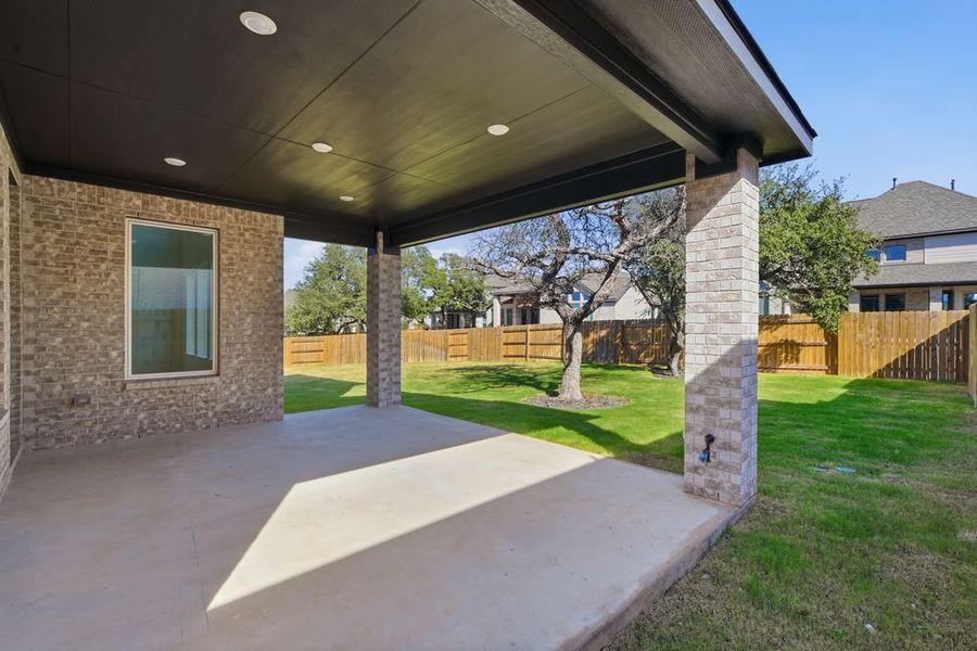 Exterior details and patio area of a home in Parkside on the River, Georgetown (Image 4).