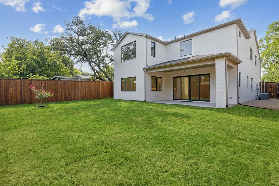 Front exterior of a new home in , Dallas, TX, highlighting curb appeal (Image 42).