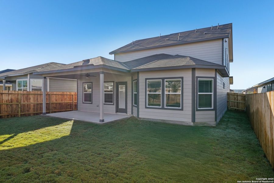 Exterior details and patio area of a home in Estancia Ranch - Premier Series, San Antonio (Image 3).