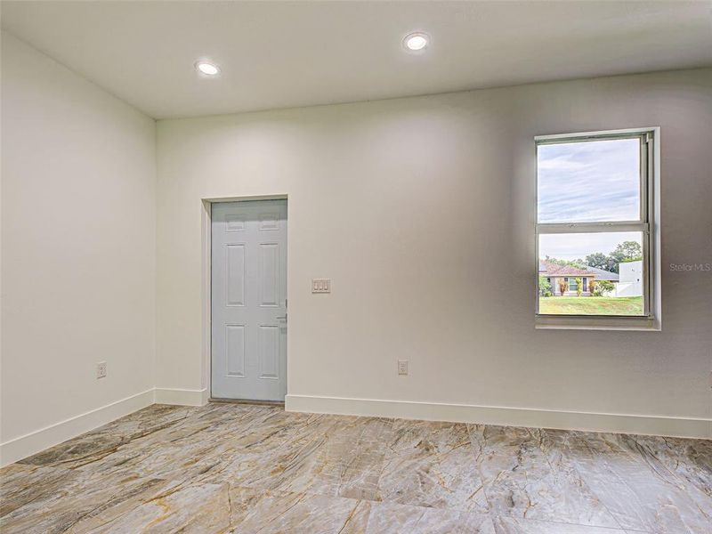 Spacious, unfurnished interior of a new home in , Port Charlotte (Image 40).