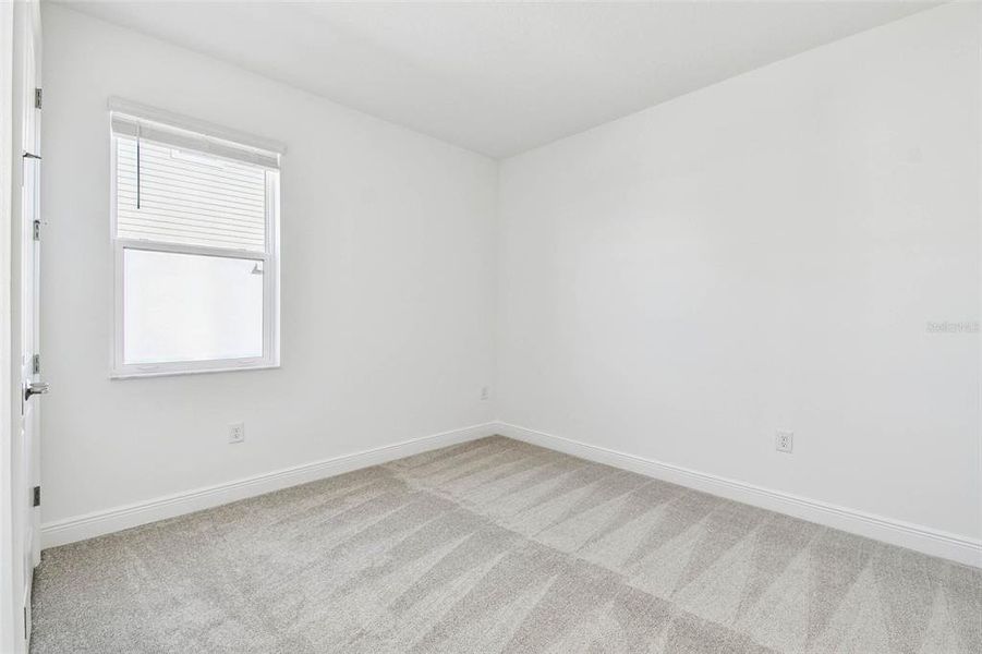 Spacious, unfurnished interior of a new home in Hawkstone, Sarasota (Image 32).