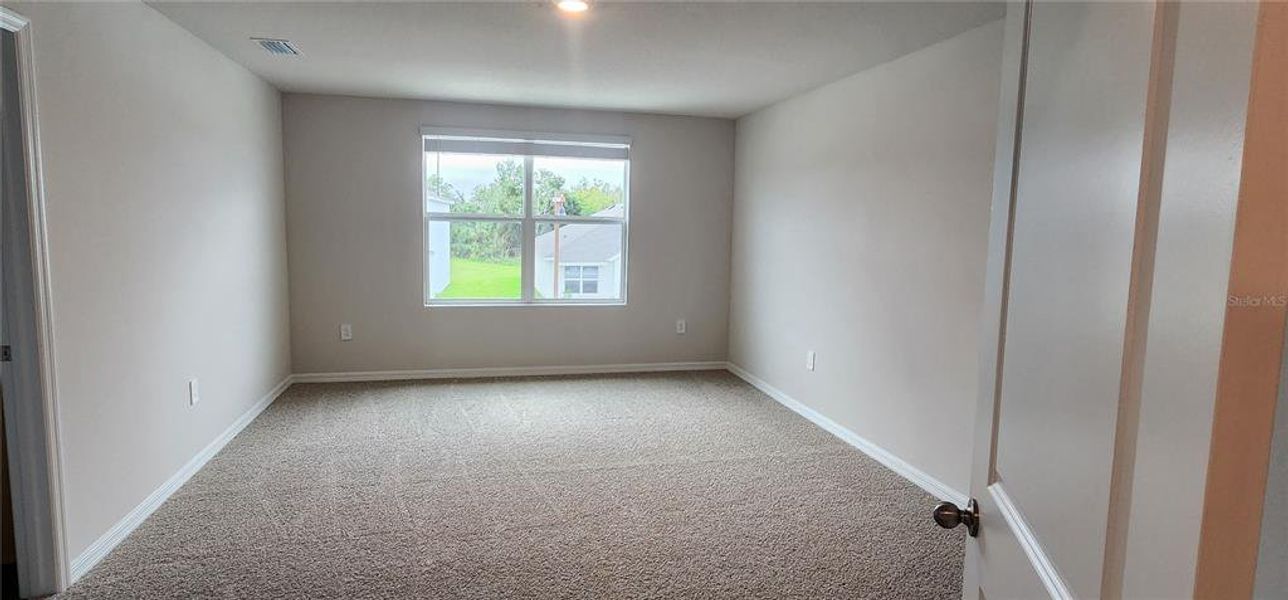 Spacious, unfurnished interior of a new home in Oakfield Lakes, Parrish (Image 17).