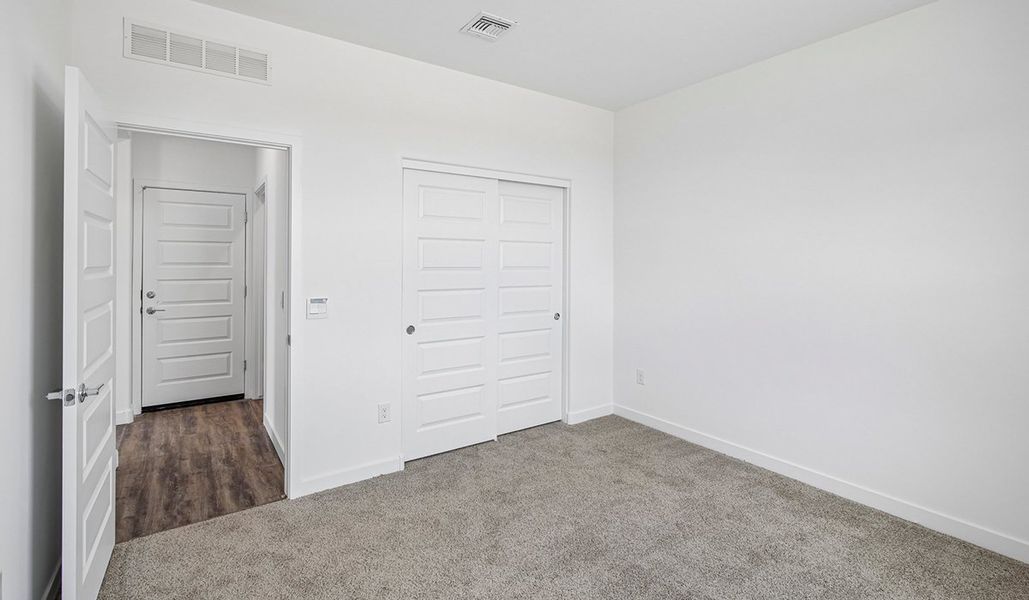 Spacious, unfurnished interior of a new home in The Oasis at Rocking K, Vail (Image 16).