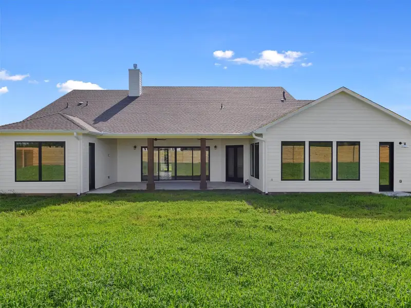 Exterior details and patio area of a home in , Smithville (Image 18).