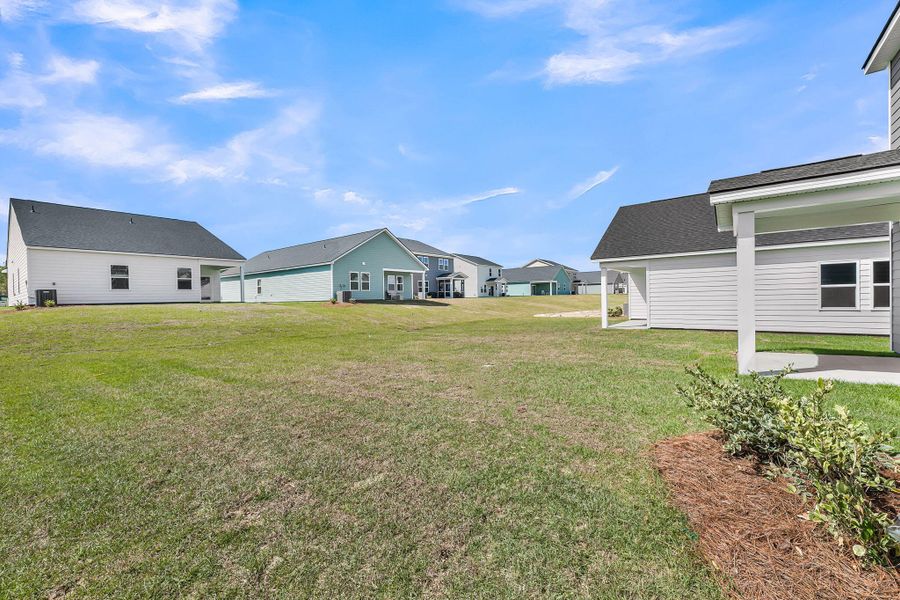 Exterior details and patio area of a home in Tea Farm, Ravenel (Image 3).