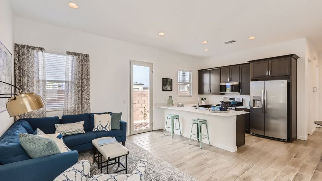 Next Gen living room overlooking the kitchen