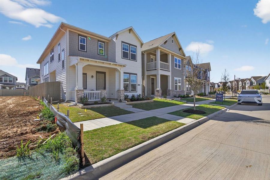 Front exterior of a new home in The Retreat at Harvest, Argyle, TX, highlighting curb appeal (Image 21).